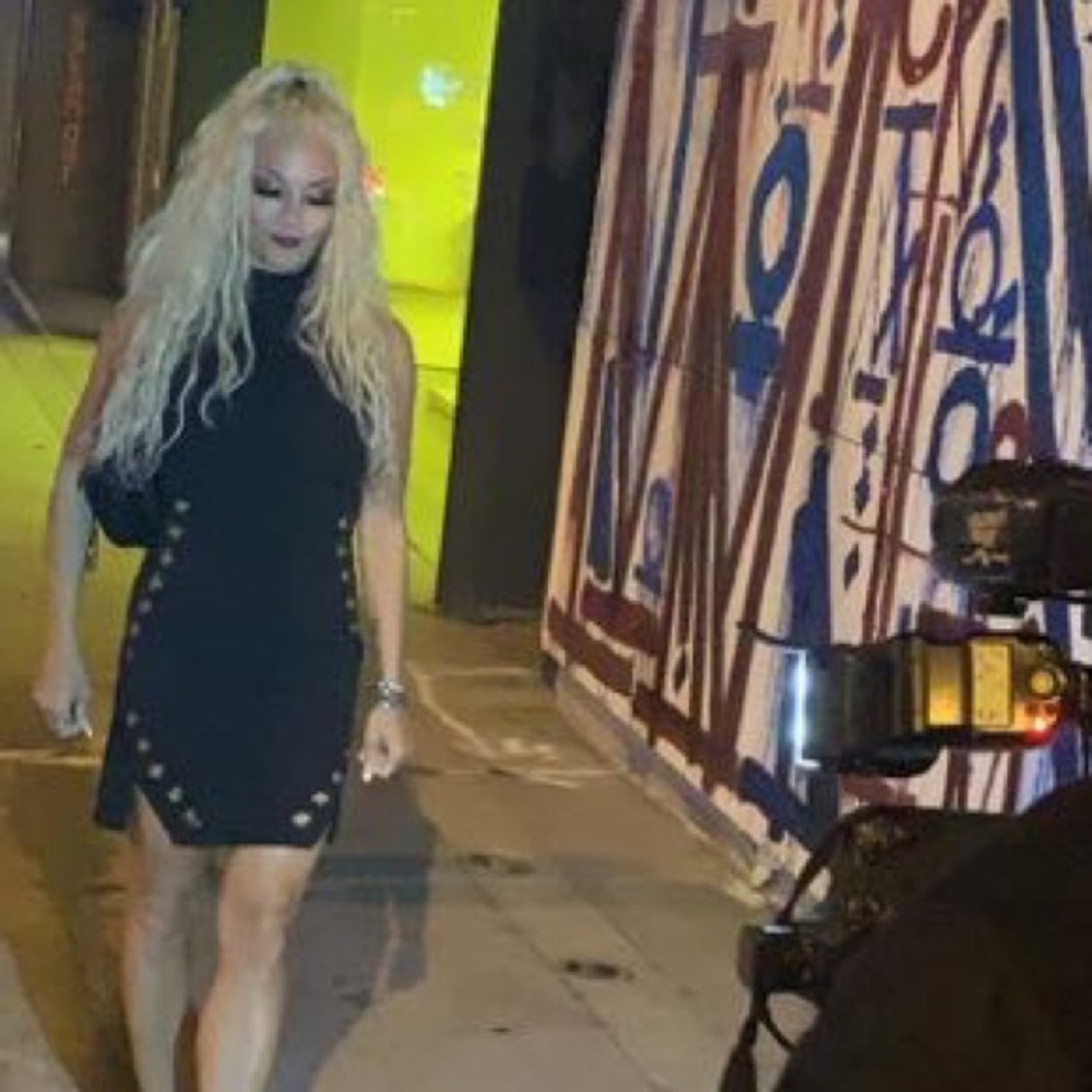 Sexy black mini dress with silver peak a boo holes